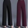 Elevate your wardrobe with our Women's Wide Leg Pants, designed for both comfort and style. Crafted from a lightweight, breathable fabric, these pants offer a relaxed fit
